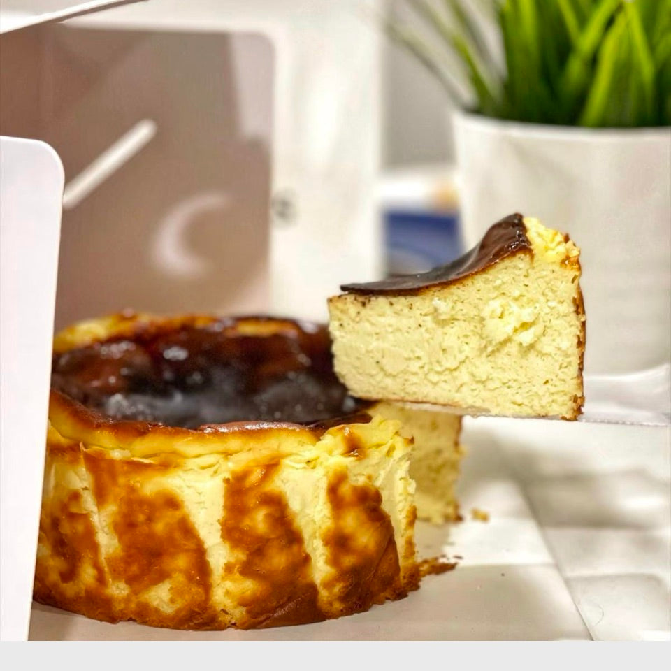 Burnt Basque Cheesecake, gluten free, showcasing its creamy texture and caramelized top.