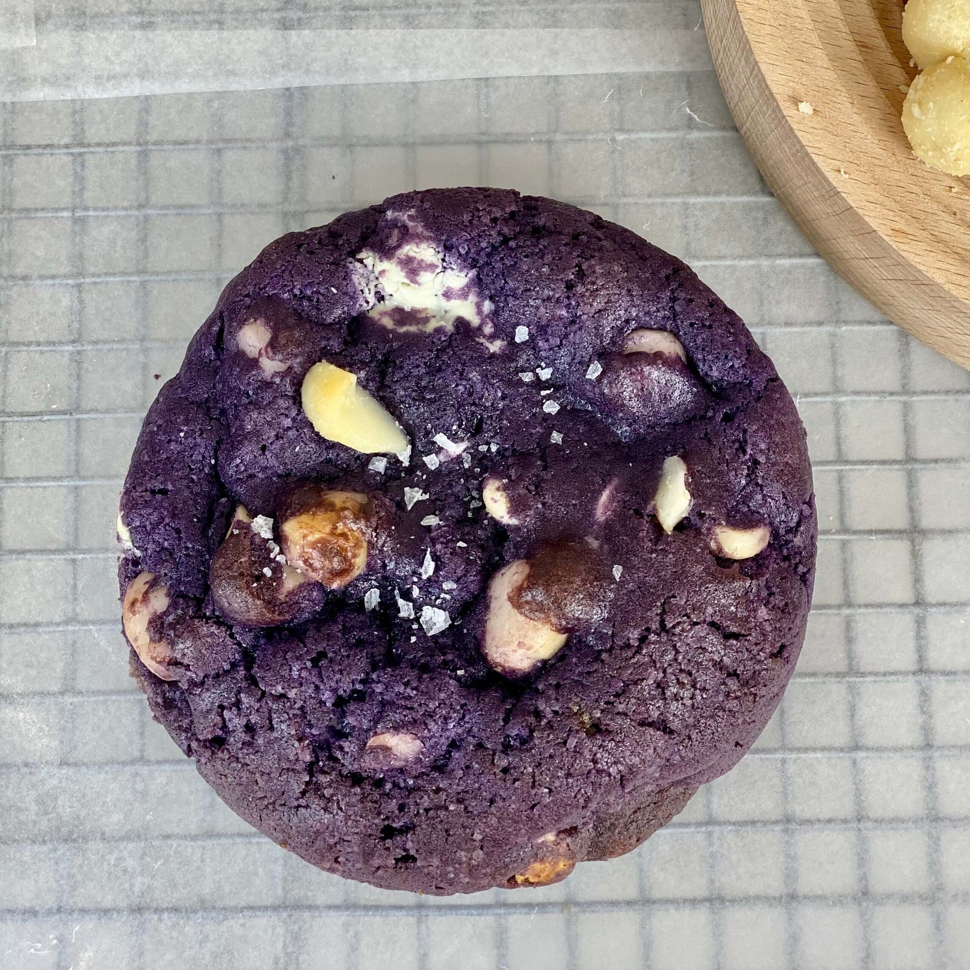 Ube White Chocolate Macadamia Cookies, thick chewy cookie with ube, white chocolate chunks, and macadamia nuts.