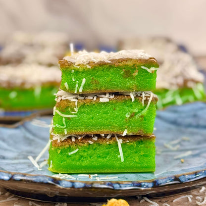 Vegan pandan coconut mochi with a chewy texture, made with sweet rice flour, creamy coconut milk, and fragrant pandan for a tropical, plant-based treat.