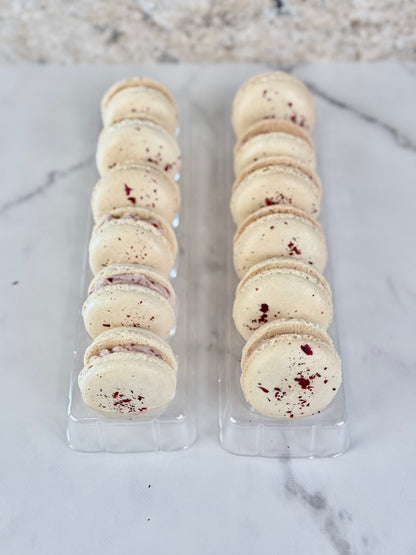 Delicate pink rose macaron with crisp shells and a fragrant rose-infused buttercream filling, elegant and floral with a light, chewy bite.